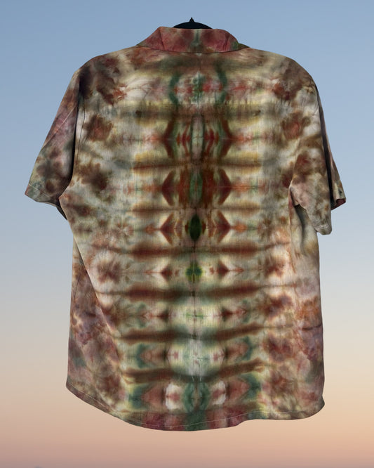 Short-sleeve shirt with a tie-dye pattern on a gradient background