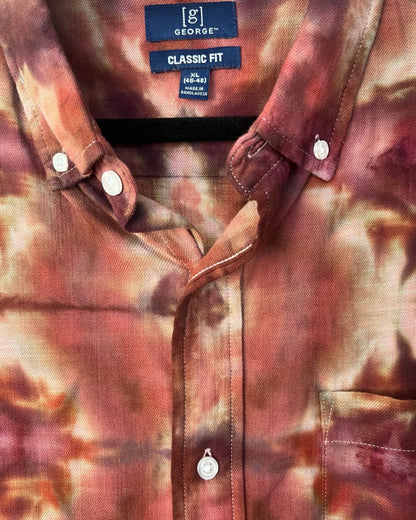 Close-up of a tie dyed shirt with branding 