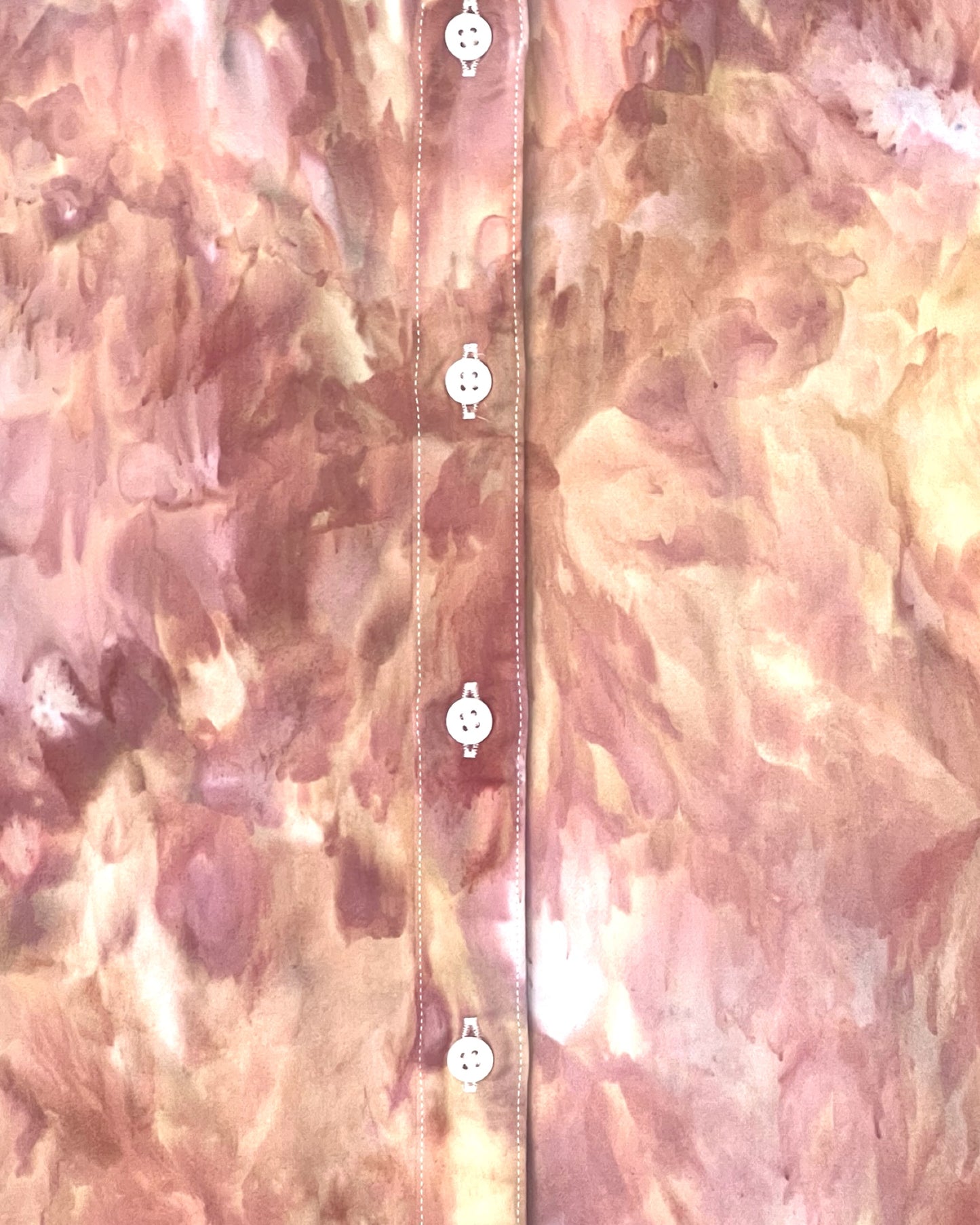 Close-up of ice dyed fabric with a focus on texture and color.