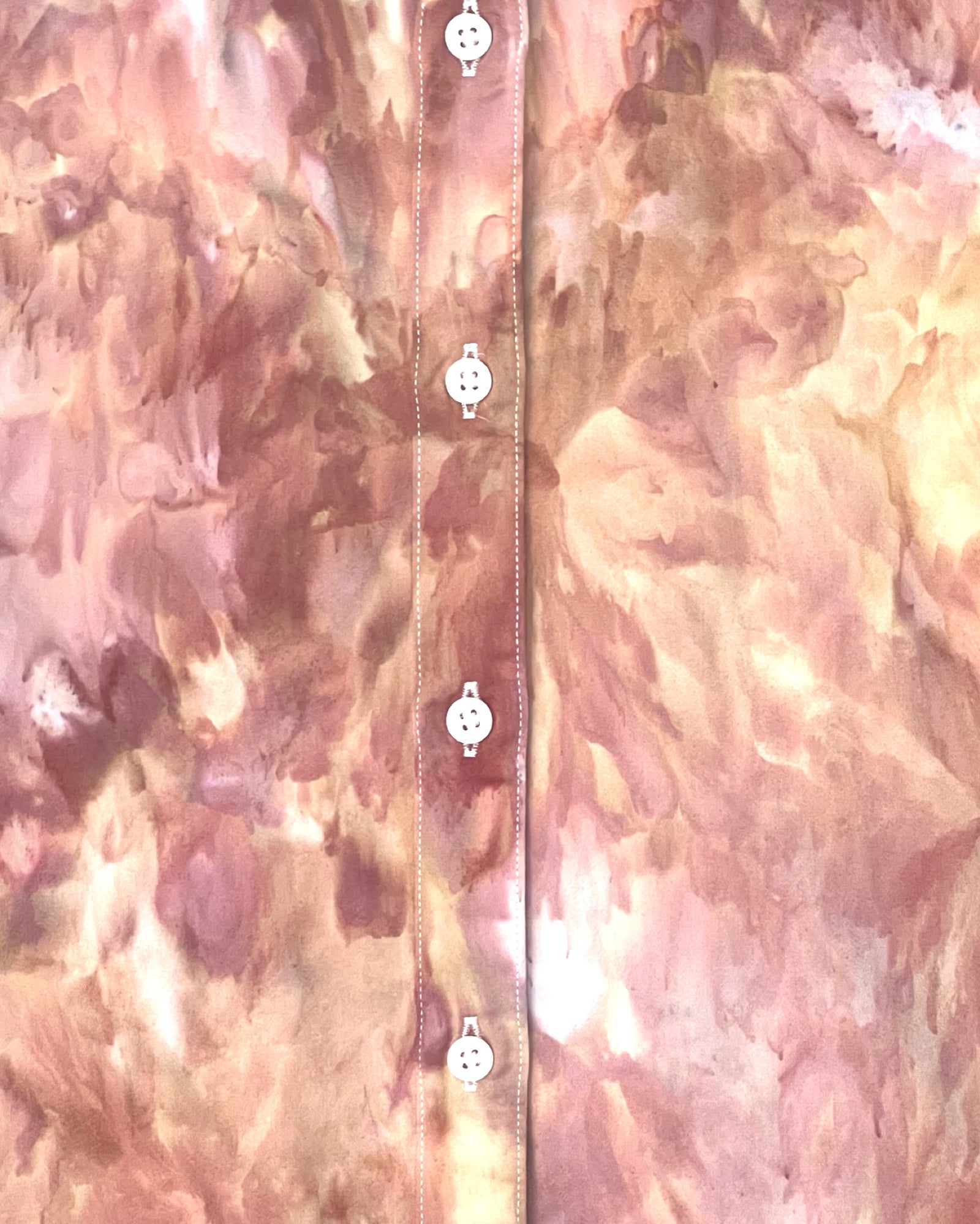 Close-up of ice dyed fabric with a focus on texture and color.