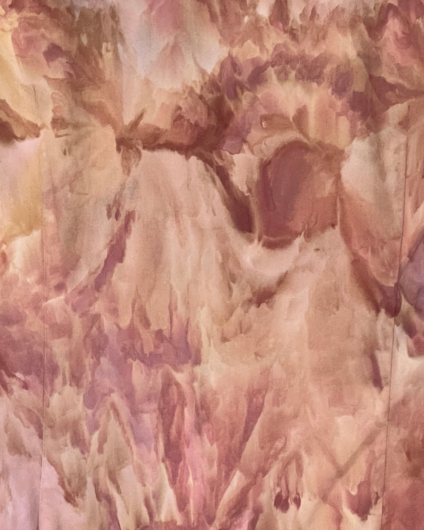 Abstract  ice dyed art with soft, blended colors in shades of pink, beige, and brown.
