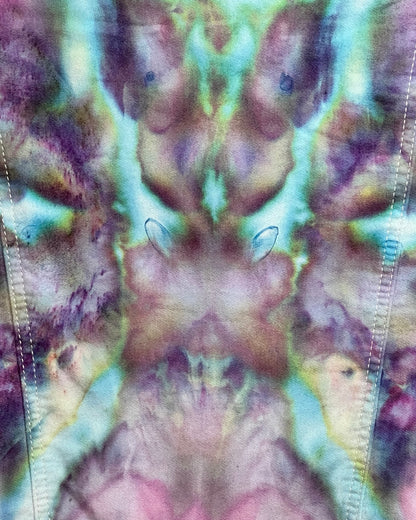 Close-up of tie-dye fabric with multicolor pattern