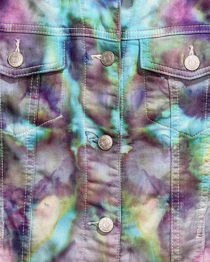 Close-up of a tie-dye jacket with button details
