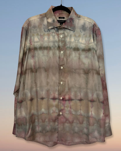 Tie-dye shirt on a hanger with a gradient background