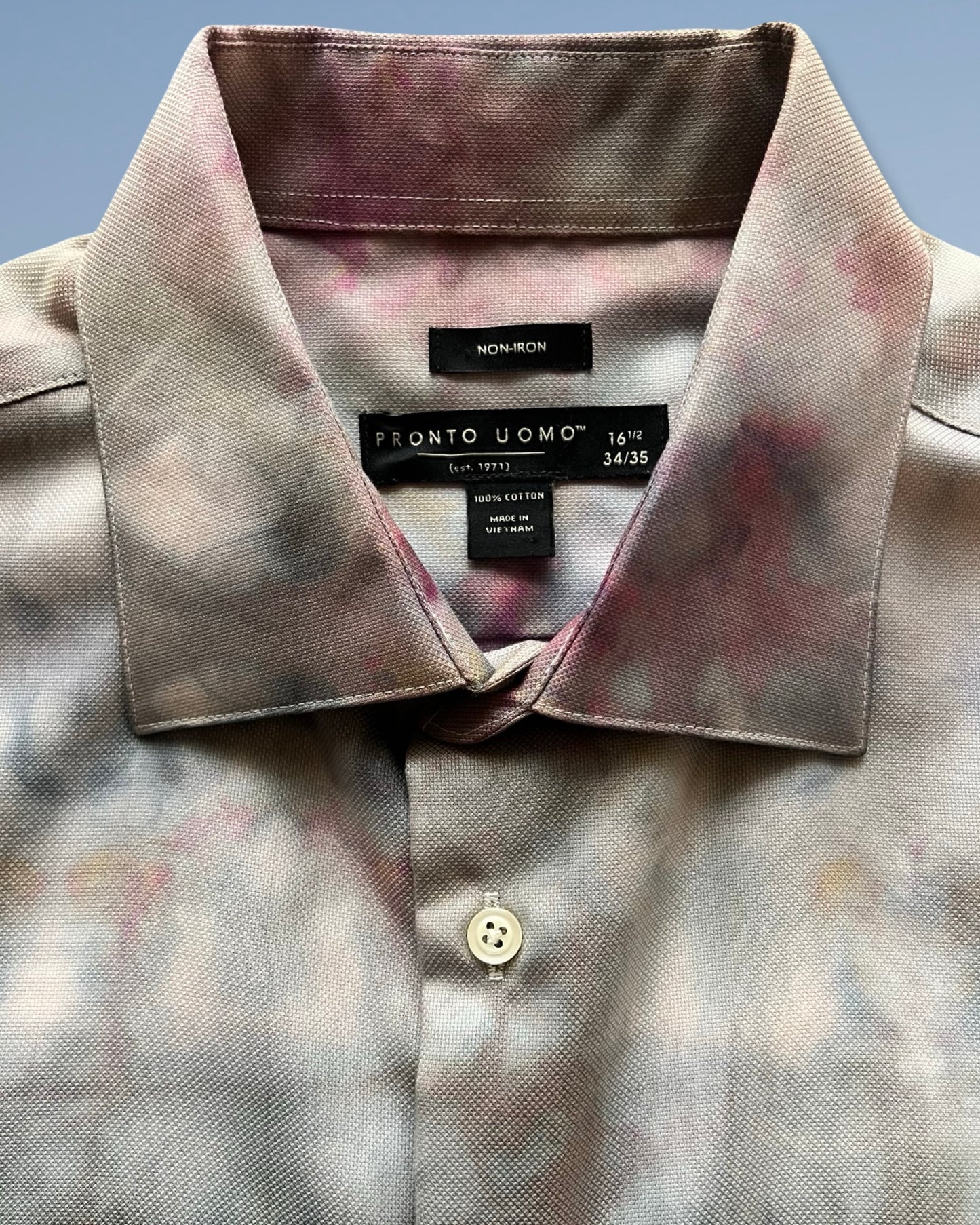 Close-up of a  shirt collar with a blurred background