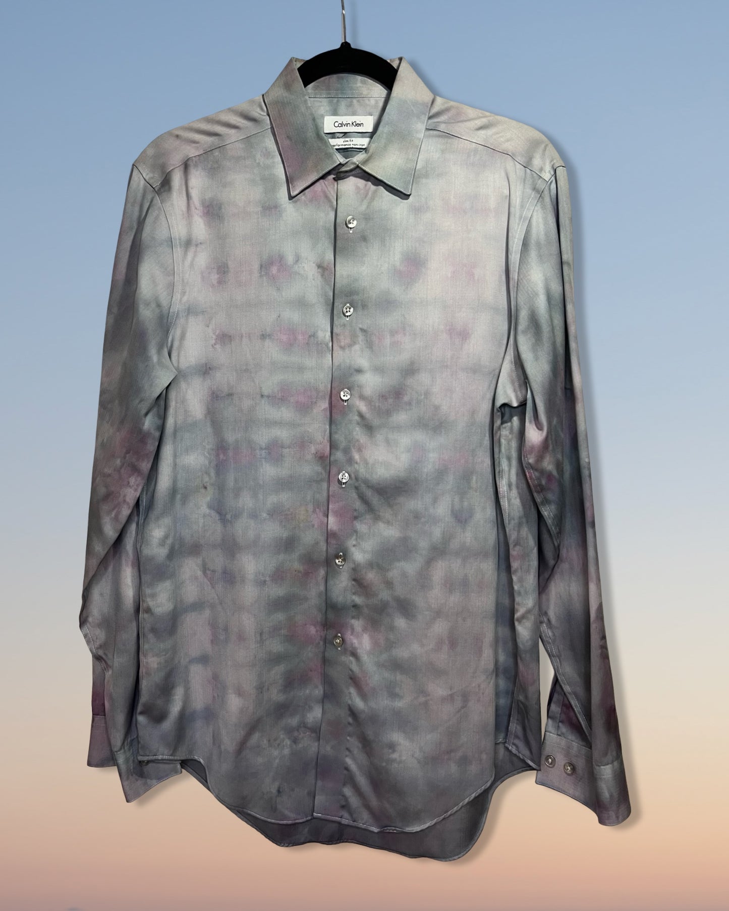 tie dye shirt with a subtle pattern on a gradient background